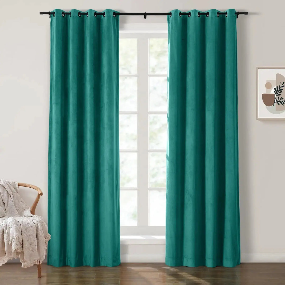 Teal grommet curtains enhancing natural light in modern living room.