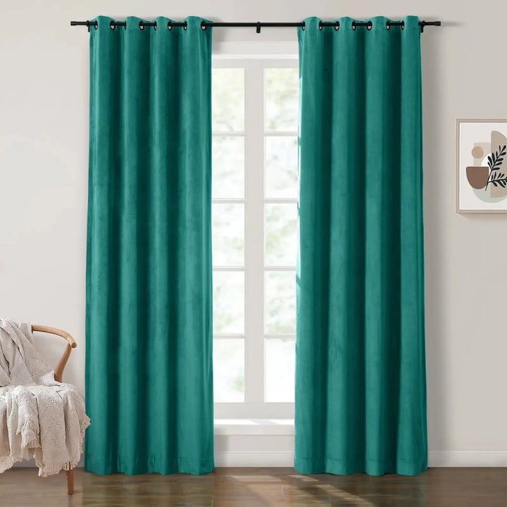 Teal grommet curtains enhancing natural light in modern living room.