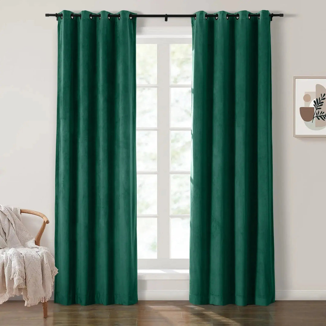Teal grommet curtains providing privacy and style in a bright living room.
