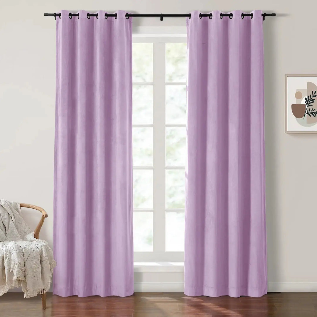 Light purple grommet curtains enhancing natural light in a bright room.