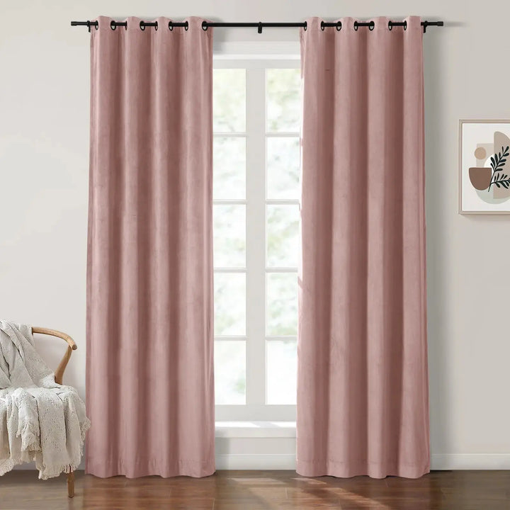 Light blush velvet grommet curtains enhancing brightness in a sunny living room.