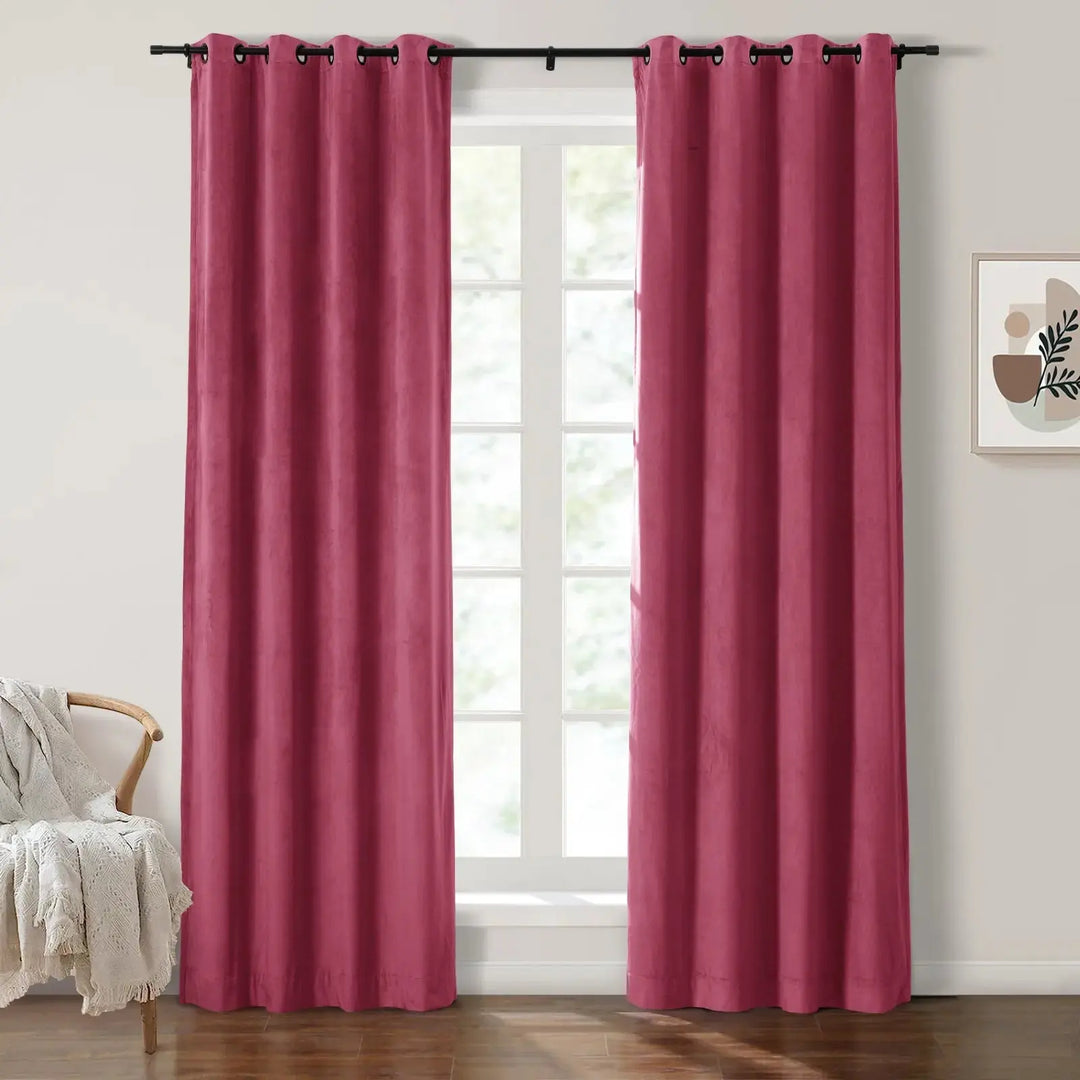 Burgundy grommet curtains enhancing natural light in a stylish living room.