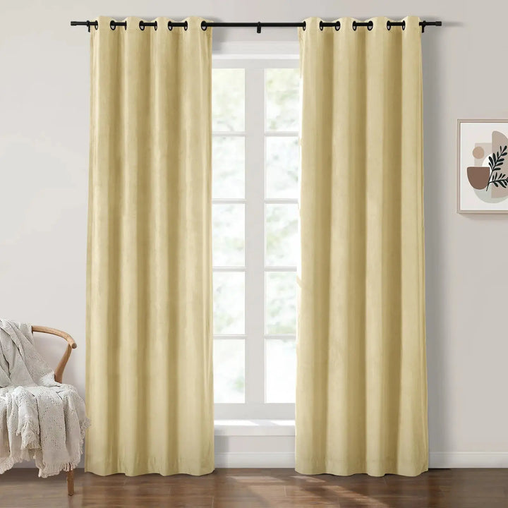 Light beige grommet curtains enhancing brightness in a modern living room.