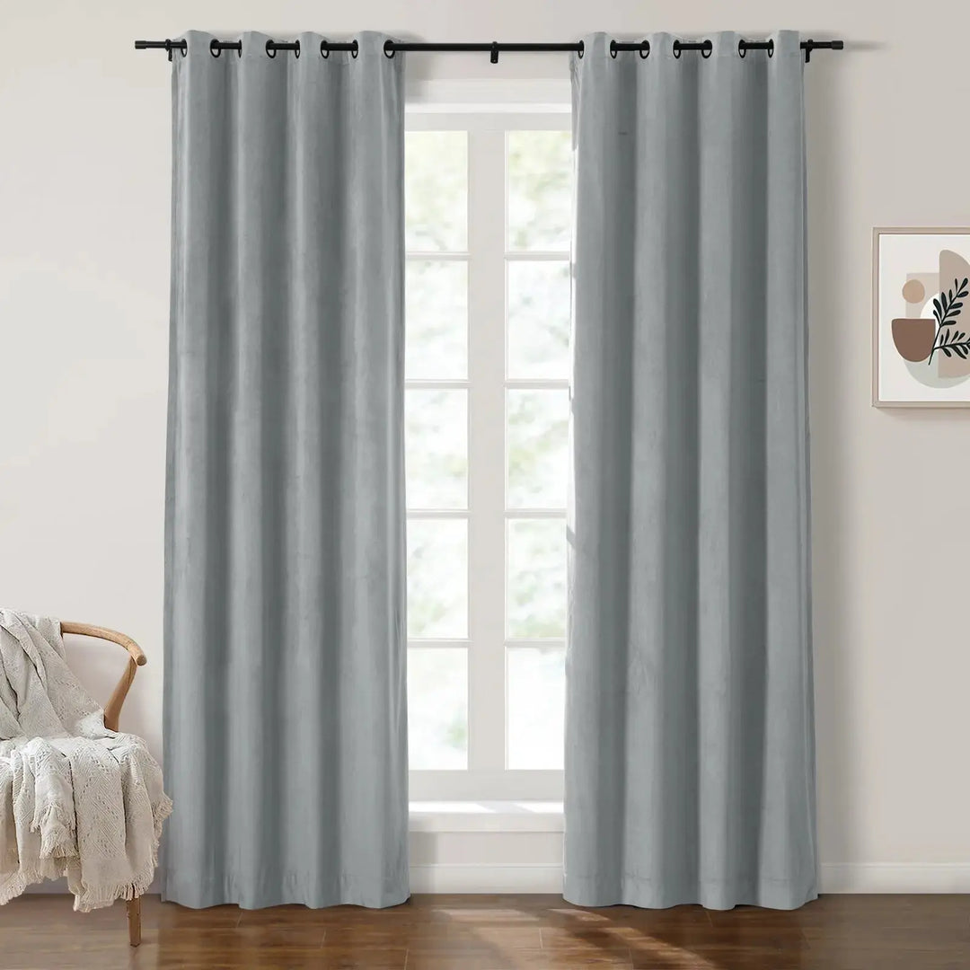 Light gray grommet curtains enhancing natural light in a modern living room.