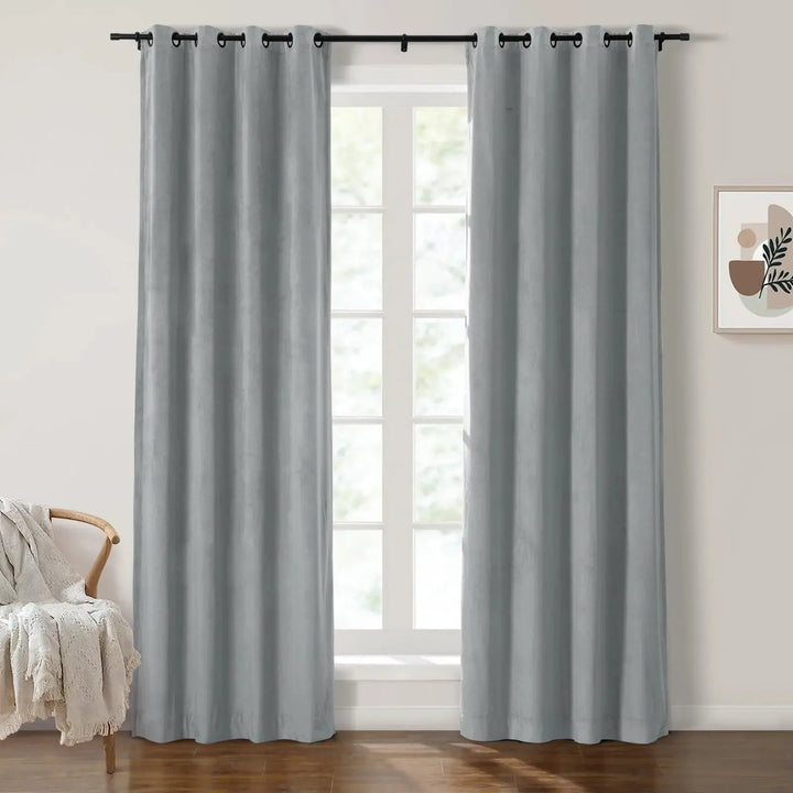 Light gray grommet curtains enhancing natural light in a modern living room.