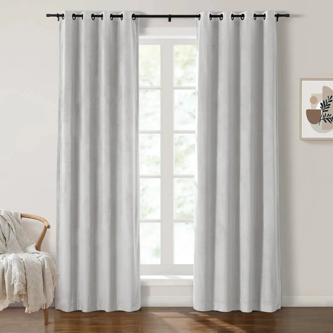 Light gray grommet curtains enhancing natural light in a modern living room.