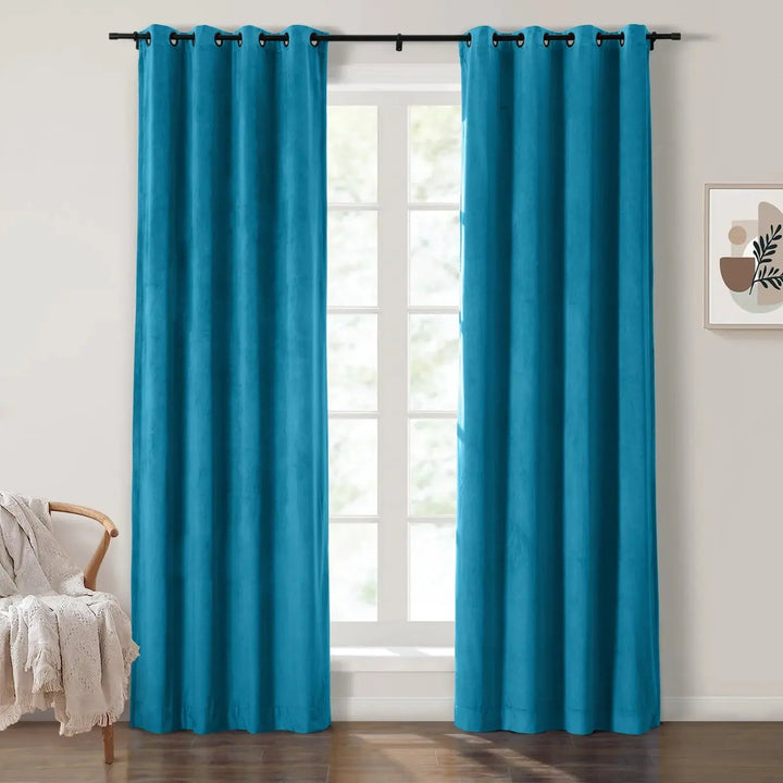 Turquoise grommet curtains enhancing natural light in a bright living room.