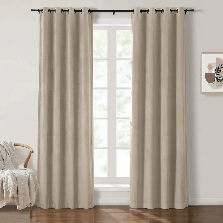 Light beige grommet curtains enhancing natural light in a stylish living room.